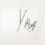 Chic Stylish Modern Monogram Script  Planner<br><div class="desc">Stay organised in style with this elegant planner featuring a soft sage green "M" monogram and your name in delicate script. Designed for productivity with a personal touch, this planner offers space for goals, schedules, and to-do lists—all wrapped in a clean, minimalist cover. Perfect for students, professionals, or as a...</div>