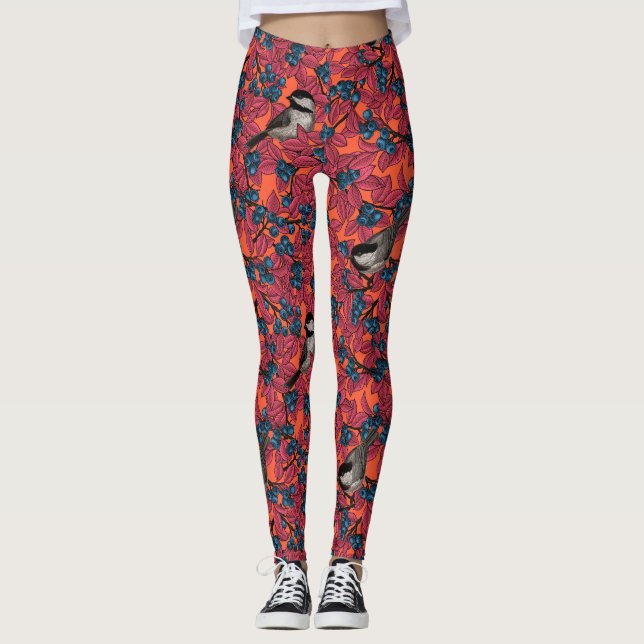 Chickadee birds on blueberry branches on orange leggings (Front)