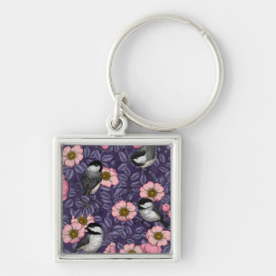 Chickadees in the wild rose in pink and violet key ring