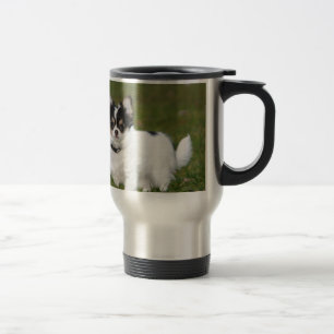 Chihuahua dog standing on a green lawn travel mug