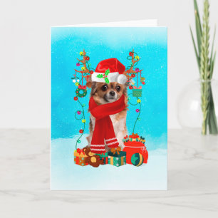 Chihuahua in snow with Christmas gifts Card