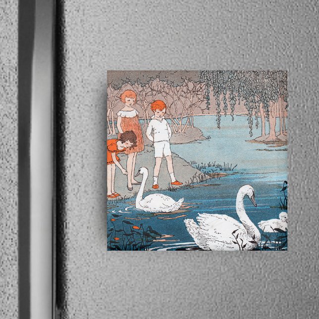 Children and  Swans Magnet (Children red hair at shore of blue lake feeding pretty white swans on square magnet.)