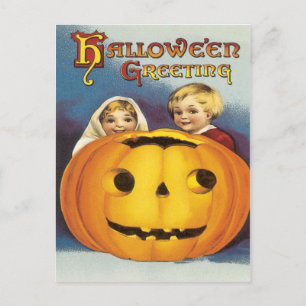Children Behind A Pumpkin Vintage Postcard