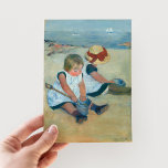 Children on the Beach | Mary Cassatt Postcard<br><div class="desc">Children on the Beach (1884) by American impressionist artist Mary Cassatt. Original artwork is an oil painting on canvas depicting a portrait of 2 young girls sitting at the beach. 

Use the design tools to add custom text or personalise the image.</div>