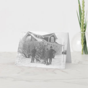 Children outside with Christmas tree Holiday Card
