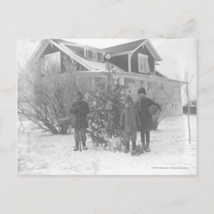 Children outside with Christmas tree Holiday Postcard