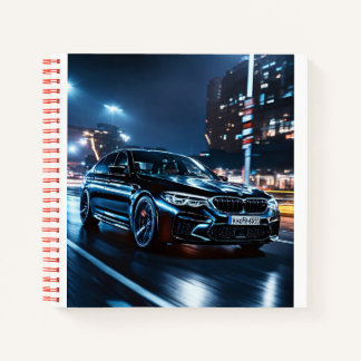 children white page notebook with bmw printed