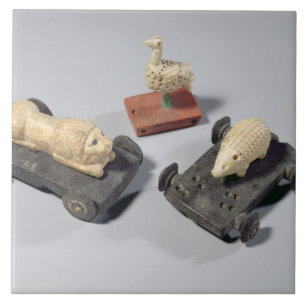 Children's toys: a hedgehog, a lion and a dove, Su Tile