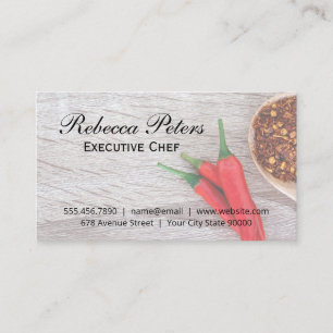 Chilli Peppers and Flakes on Wooden Table Business Card