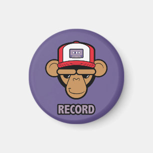Chimp with a cassette tape on his hat magnet