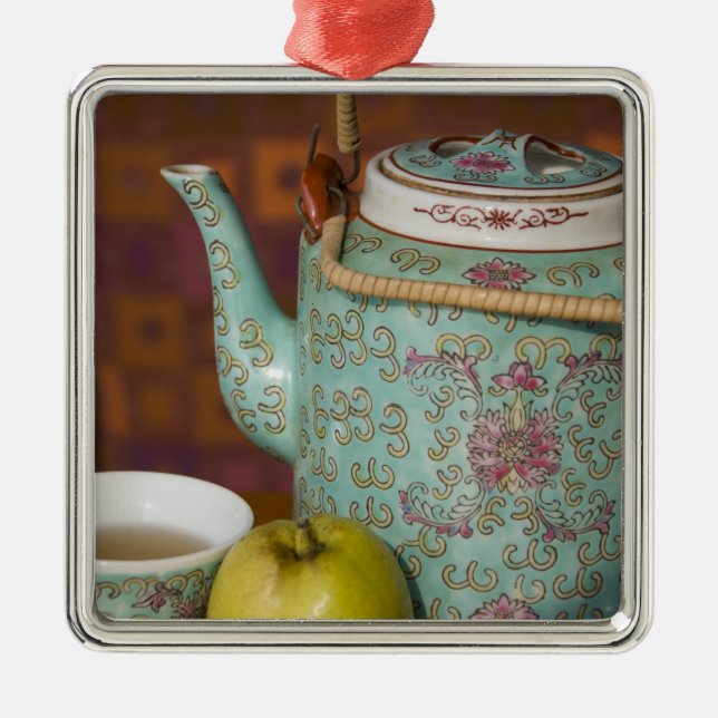 China, Hong Kong. Traditional Chinese teapot & 2 Metal Tree Decoration (Front)