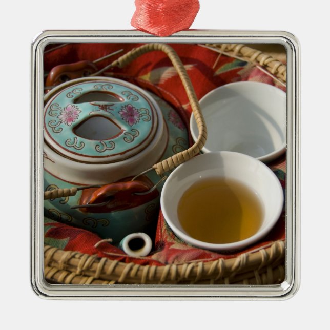 China, Hong Kong. Traditional Chinese teapot & 3 Metal Tree Decoration (Front)