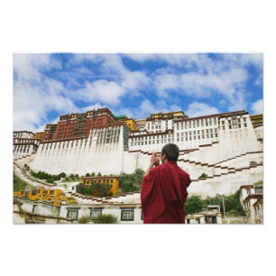 China, Tibet, Lhasa, Tibetan monk with Potala Photo Print