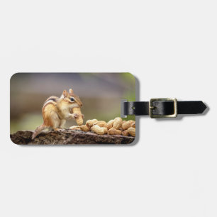 Chipmunk eating a peanut luggage tag