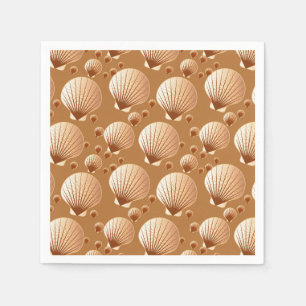 Chocolate and tan seashells on cocoa brown napkin
