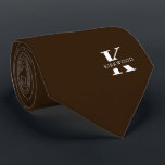 Chocolate Brown Elegant Monogram   Name Tie<br><div class="desc">An elegant necktie featuring a bold white monogram across a rich Chocolate Brown background. On top of this monogram sits your first or last name spelled out in all capitals. If you prefer a bolder look for the personal name inside of the large letter you can do the following: Use...</div>