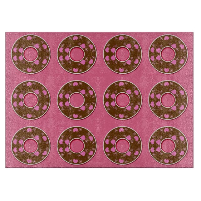 Chocolate doughnuts doughnuts on pink cutting boar cutting board (Front)