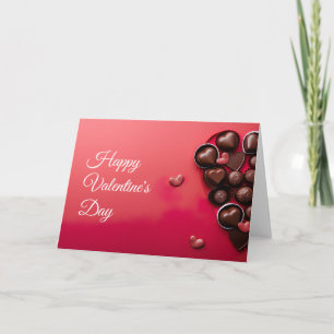 Chocolate hearts on dark red ground Valentine's Card