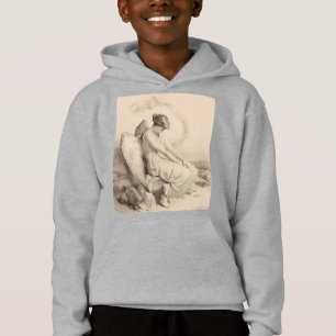 Christian angel sitting on a stone