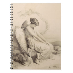Christian angel sitting on a stone notebook