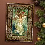 Christmas Angel Card<br><div class="desc">Beautiful Christmas angel in flowing white robe and wings,  surrounded by gold star and holly on cloud background bordered by ornate gold frame. Inside is embellished with subtle filigree border with completely customizable text. Matching address labels and postage stamps available.</div>