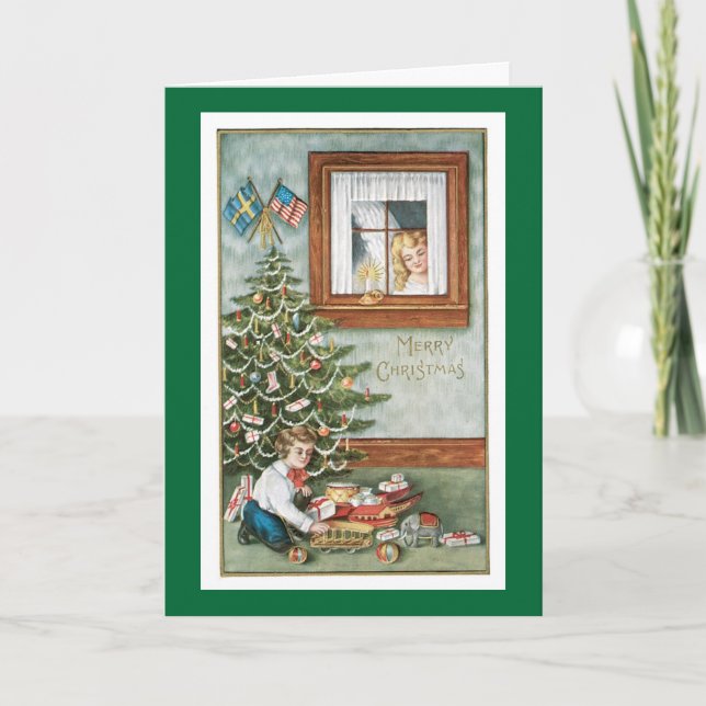 Christmas Angel watching over boy with toys Holiday Card (Front)