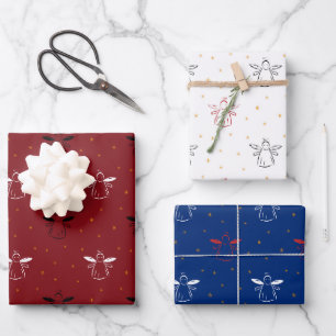Christmas angels on red, blue and white wrapping paper sheet
