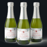 Christmas Baby Clothes Merry Little Baby Shower Sparkling Wine Label<br><div class="desc">The Christmas Baby Clothes Merry Little Baby Shower Sparkling Wine Label adds a festive and elegant touch to your holiday-themed baby shower. Featuring a charming design with adorable Christmas baby clothes and seasonal accents, this label transforms sparkling wine bottles into stylish decor or thoughtful party favours. Perfect for toasts or...</div>