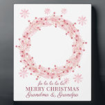 Christmas Baby Photo For Grandma And Grandpa  Plaque<br><div class="desc">Surprise grandma and grandpa with this unique sweet baby photo free standing plaque of their grandchild, framed within a Christmas wreath holiday themed border. Pink and red watercolor wreath. Simply delete this photo and upload your own close up face, baby photo. It will appear within the wreath. Be sure to...</div>