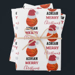 Christmas Basketball Sports Ball Custom Name Wrapping Paper Sheet<br><div class="desc">A cute illustration of basketball ball wearing a Santa hat with words "Merry Christmas" and your custom name. Perfect for adults and kids who love playing basketball. An ideal basketball themed Christmas wrapping paper for basketball players, basketball coaches, basketball teams, athletes and basketball enthusiasts. Simply customise the name and make...</div>