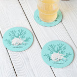 Christmas Beach Sand Dollar Starfish Aqua Blue Round Paper Coaster<br><div class="desc">This personalised beachy Christmas coaster is perfect for coastal holiday entertaining,  with aqua blue glitter coral,  white sand dollar and starfish,  and the holiday message “Seas & Greetings”,  on a light aqua blue background.</div>