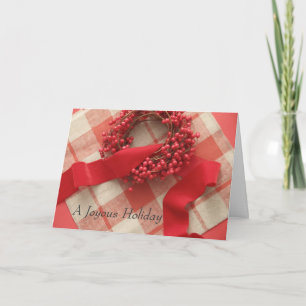 Christmas berries and wreath on plaid holiday card