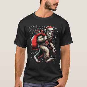 Christmas Bigfoot Santa Claus Carrying Gifts Festi T-Shirt