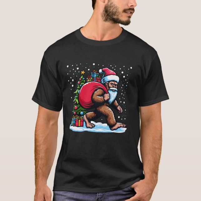 Christmas Bigfoot Santa Claus Carrying Gifts Festi T-Shirt (Front)