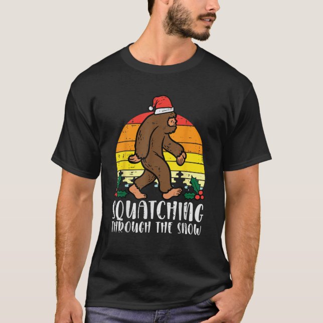 Christmas Bigfoot Squatching Through The Snow Xmas T-Shirt (Front)