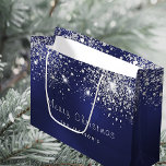 Christmas blue white glitter dust silver large gift bag<br><div class="desc">A deep blue background decorated with faux silver glitter dust.  The blue colour is uneven. Personalise and add your name.  With the text: Merry Christmas.
For gift wrapping and for party favours.</div>