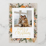 Christmas Boho Dried Botanical Family Photo Foil Holiday Card<br><div class="desc">Spread some holiday cheer with this bohemian Christmas holiday card featuring a floral arrangement of palm leaves,  greenery,  dried orange slices,  pine cones and Christmas berries on a neutral beige background. With your choice of rose gold,  gold or silver real foil.</div>