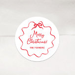 Christmas Bow | Wavy White with Red Classic Round Sticker<br><div class="desc">These adorable holiday stickers feature a trendy,  festive red wavy frame with a whimsical retro ribbon bow,  on a simple white background. Modern script says "Merry Christmas."</div>
