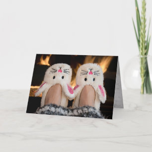 Christmas bunny slippers by fire holiday card