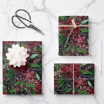 Christmas Burgundy Poinsettia Flowers Watercolor Wrapping Paper Sheet<br><div class="desc">This beautiful and artsy pattern is perfect for the Christmas holiday season. It features burgundy red, bright red, forest green, and faux gold hand-painted watercolor poinsettias, flowers, ivy leaves, and berries pattern on top of a dark navy blue background. It's modern, festive, unique, and elegant. Stylise with this hand-painted print...</div>