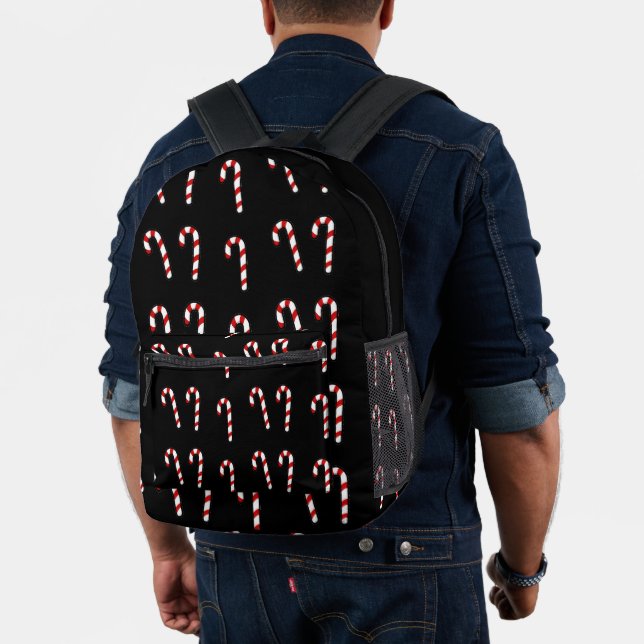 Christmas candy cane on black printed backpack (Insitu (Model))