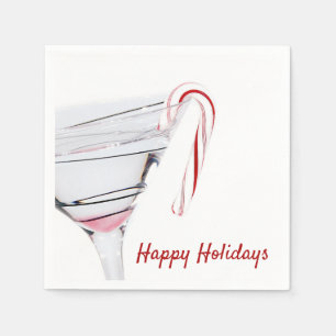 Christmas candy cane on cocktail glass napkin