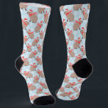 Christmas Capybara Funny Holiday Animal Socks<br><div class="desc">These adorable socks feature capybaras wearing Santa Hats and Scarves in a snowy blue winter background. The perfect novelty gift or stocking stuffer for a capybara lover!</div>