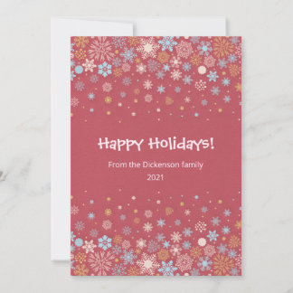Christmas card of pink, blue and gold snowflakes