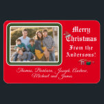 Christmas Card Photo Magnet<br><div class="desc">Christmas Card Photo Magnet design features your photo in top left corner against a red background. Photo is framed by a lovely green and white border. Customisable heading reads, "Merry Christmas" in white lettering. Image of a Santa hat is balanced on top of the "C". Wording just below reads, "From...</div>