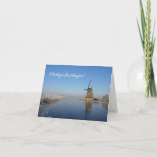 Christmas card winter landscape with windmill