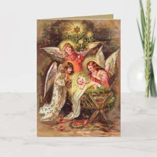 Christmas card with angles watching Baby Jesus