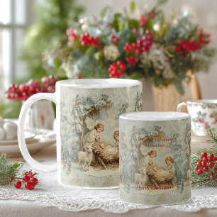 Christmas card with baby Jesus in a manger and ang Coffee Mug