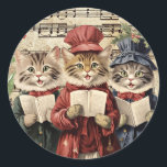 Christmas Caroling Cats Classic Round Sticker<br><div class="desc">Vintage illustration of three cats singing Christmas carols.</div>