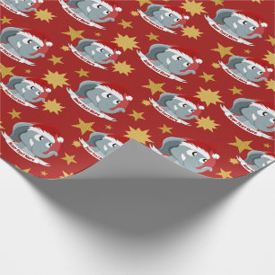 Christmas cartoon with a cute elephant wrapping pa wrapping paper